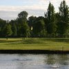 A view over the water of a hole at McKay Creek Golf Course & Driving Range