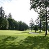 A sunny view of green at McKay Creek Golf Course & Driving Range