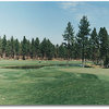 Aspen Lakes: Hole #16 - A dogleg left par 4 protected by water along the entire left side. Favor the right side off the tee. Approach shot is to an elevated green with grass bunkers on right and bunker behind.. ( Dave Blackledge )