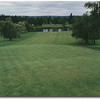 Hole #18 is similar to #9 with the exception that you tee off on the other side of the slough. The green is easily reachable in two but watch for the trees that line both sides of the fairway. The two-tiered green is a shelf that was cut into the side of 