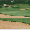 A very long 602 yards from the black tees. Hole #9 is a dogleg right with fairway bunkers on the right at the turn and on the left about 150 yards from an elevated green. Two green side bunkers protect the right side with rough that runs sharply uphill to
