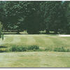 Eastmoreland: Hole #14 starts with a slightly elevated tee to an open fairway. A few trees line the left and right. Setting up for your approach shot, you will find two large Willow Trees that jut in on the left and right and a creek that cuts across the 