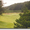 Highlands Golf Club #8: Same distance as the previous hole. This one starts with a tee shot between two trees to a narrow fairway. There's rough left and right with the fairway running uphill on both sides. The green is long and protected by two bunkers