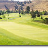 The photo was taken from the back of the green. Your tee shot must avoid the water and the tree along the left fairway. Watch for pin placement on your approach shot. The undulating green is elevated and very long.