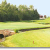 The seventh is a medium length par 5 featuring dramatic mounding along the entire right side. The tee shot must be played over a short crossing bunker, and a meandering creek bisects the second shot landing area. For some, this hole may be reachable with 