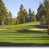 River's Edge #13: Your tee shot should be played left to avoid a fairway bunker (not shown) to the right. Attempt to leave the ball below the hole on your approach shot. Mt. Jefferson can be seen in the distance.