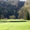 Hole #16: Beautiful hole. A creek runs along the left fairway to a pond in front of an elevated green. The green runs downhill back to front.