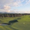 Florence Golf Links #10: A straight tee shot is a must on this long par 4. Mounds on the left will leave an awkward lie. Anything right will be lost in the trees or the sand dunes. The green is a flat putting surface. 