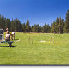The driving range is open and off of grass. Range balls are complimentary with your greens fees!