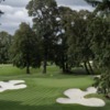 A view of a green with bunkers coming into play at Eugene Country Club
