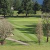 A view of green with narrow path on the left at Umpqua Golf Resort