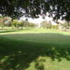 A sunny day view of a hole at Big River Golf Course.