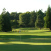 A sunny day view of a hole at Charbonneau Golf Club.