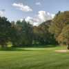 A sunny day view of a hole at Creekside Golf Club.