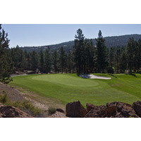 Avoid the bunker to the right of the 15th green at Awbrey Glen Golf Club in Bend, Ore.