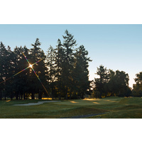 The fourth green at Rose City Golf Course is protected by the large sand bunker on the right.